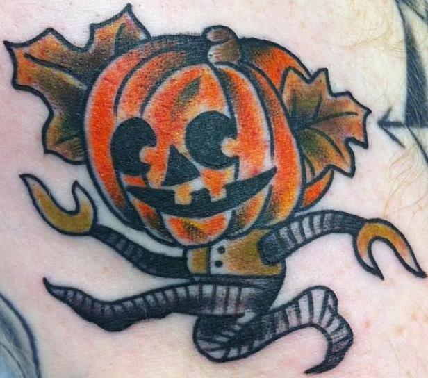 Maple Leafs And Cute Halloween Pumpkin Tattoo