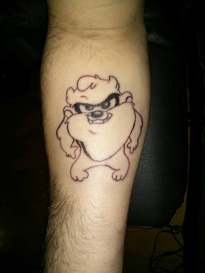 Outline Baby Taz Tattoo On Right Forearm