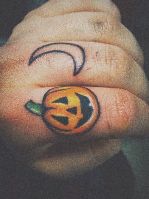 Outline Moon and Pumpkin Tattoo On Finger