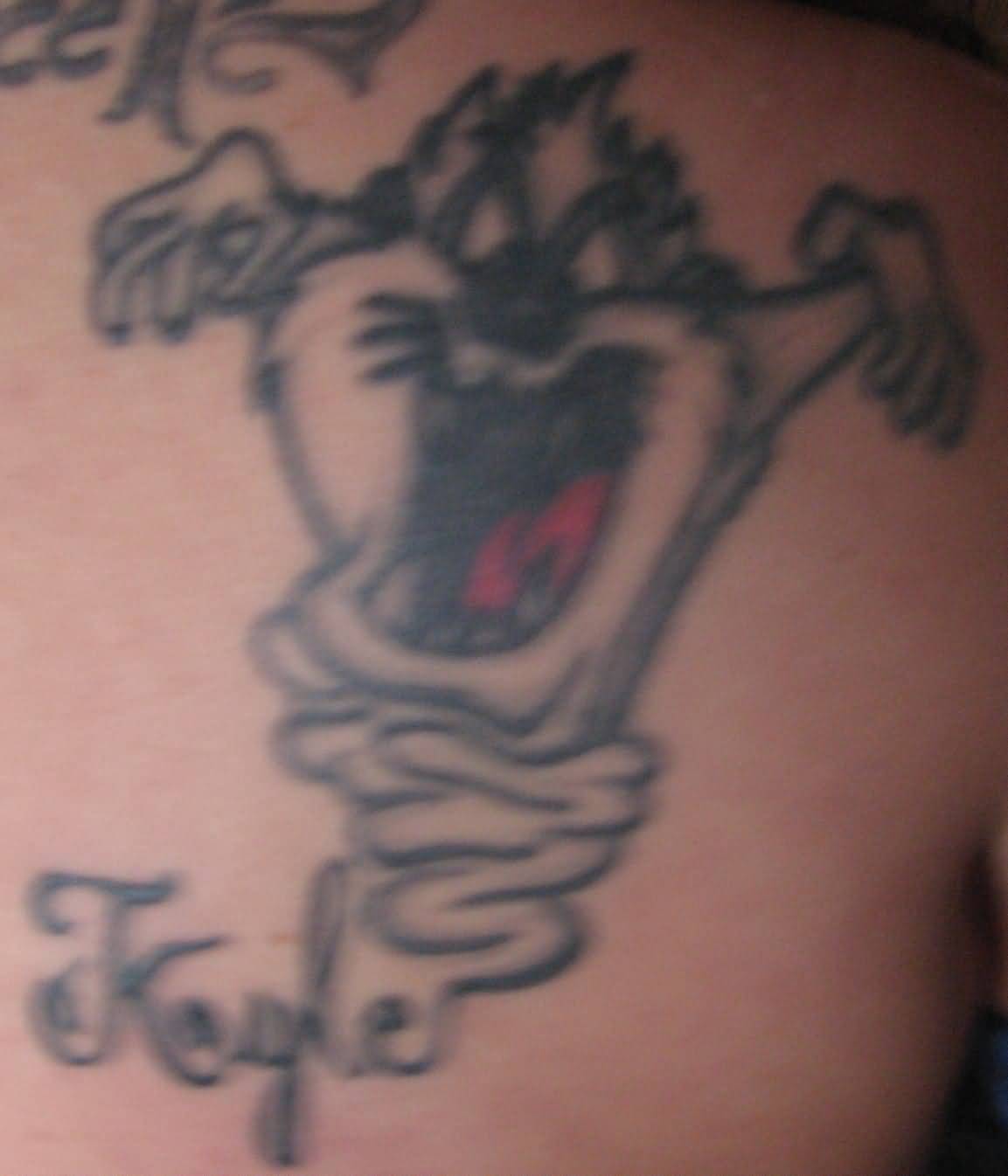 Outline Taz Tattoo On Right Back Shoulder