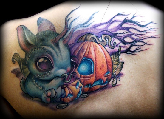 Rabbit and Evil Pumpkin Tattoo On Back Shoulder