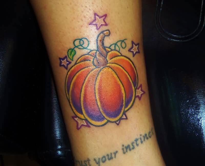 Stars And Cute Pumpkin Tattoo On Leg by Kevin Gordon