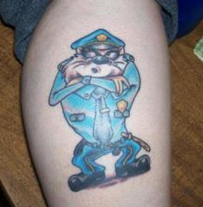 Taz In Security Guard Dress Tattoo On Leg
