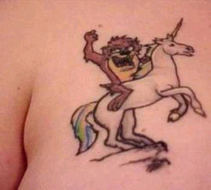 Taz On Unicorn Tattoo On Chest