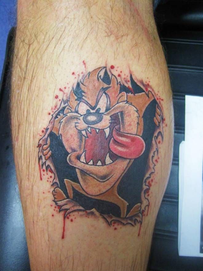 Torn Skin Tasmanian Devil Tattoo On Leg Calf