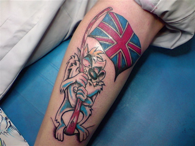 UK Flag And Taz Tattoo On Leg