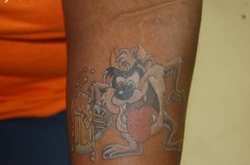 White Ink Taz Tattoo by Phillip On Left Arm
