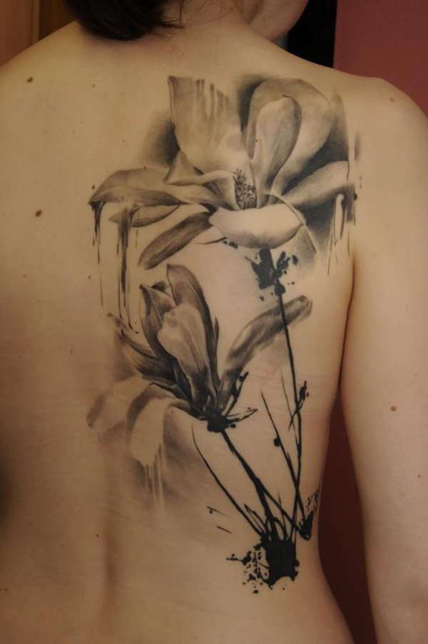 Amazing Magnolia Tattoo On Girl Right Back Shoulder