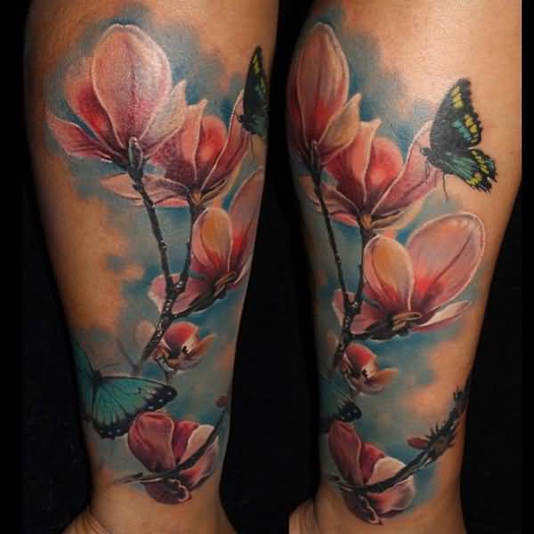 Awesome Colored Butterfly And Magnolia Tattoo On Leg by Laura Juan