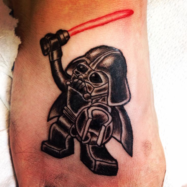 Black And Grey Lego Darth Vader Tattoo On Foot