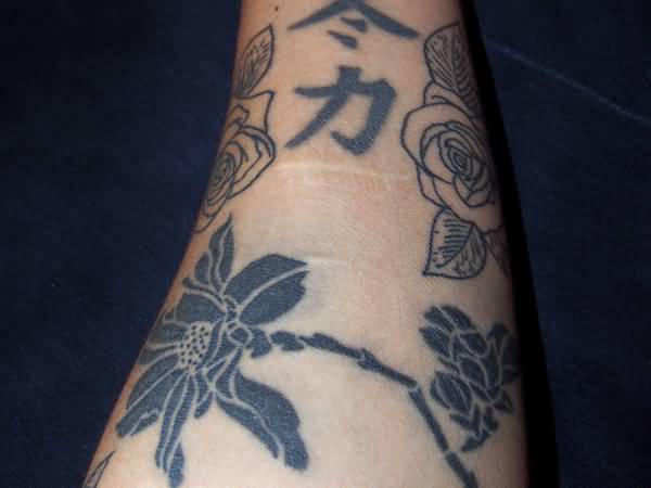 Black And White Magnolia Flowers Tattoos On Forearm