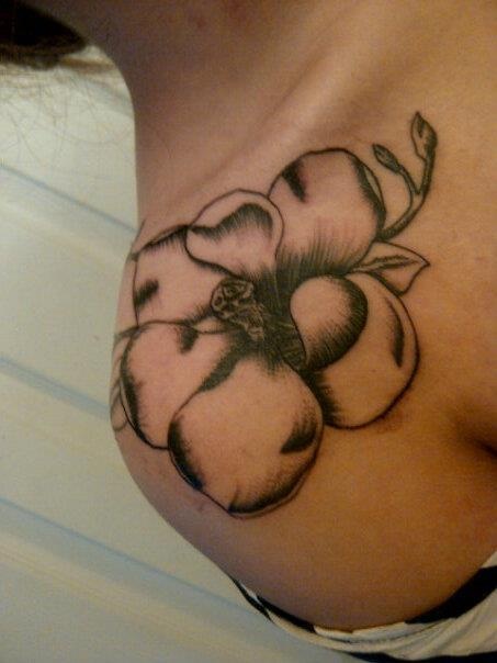 Black And White Magnolia Tattoo On Front Shoulder