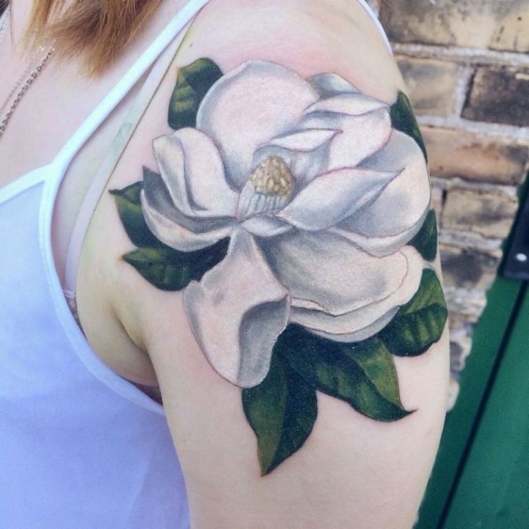 Black And White Magnolia Tattoo On Left Shoulder