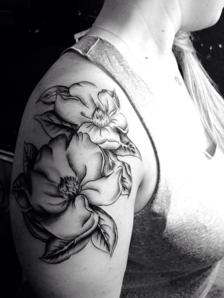 Black And White Magnolia Tattoo On Right Shoulder