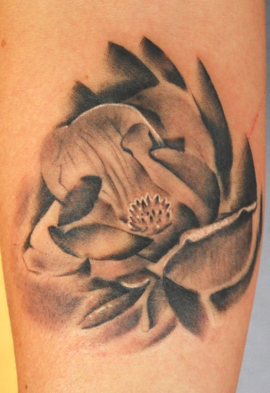 Black And White Magnolia Tattoo On Sleeve