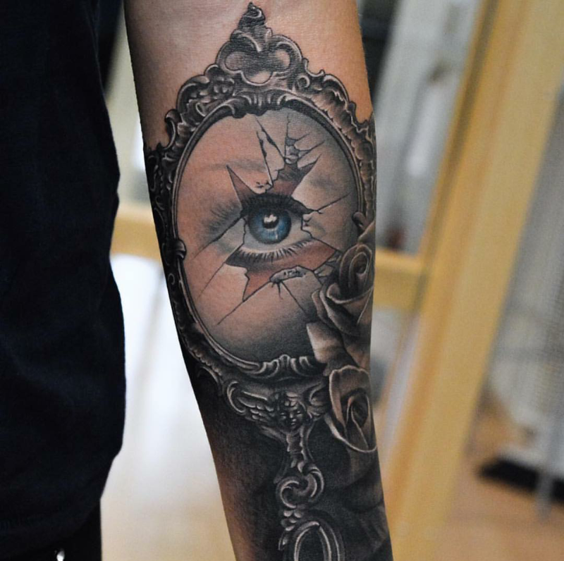Broken Hand Mirror Tattoo On Left Sleeve by Martinsjoooberg