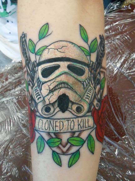 Cloned To Kill Banner And Stormtrooper Tattoo On Forearm