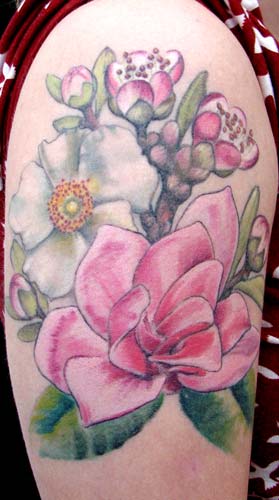 Colored Magnolia Flowers Tattoo On Right Half Sleeve