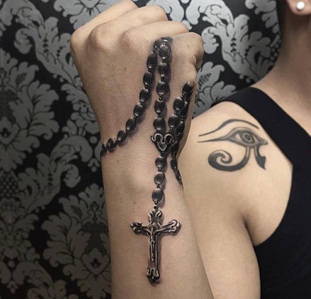 Egyptian Eye And Rosary Tattoo On Shoulder and Right Hand by Rods Jimenez