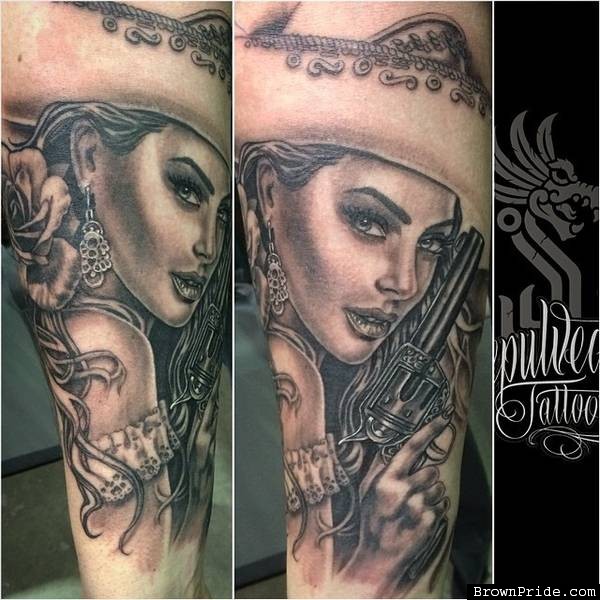 Grey Ink Charra With Gun Tattoo by Victor Sepulveda