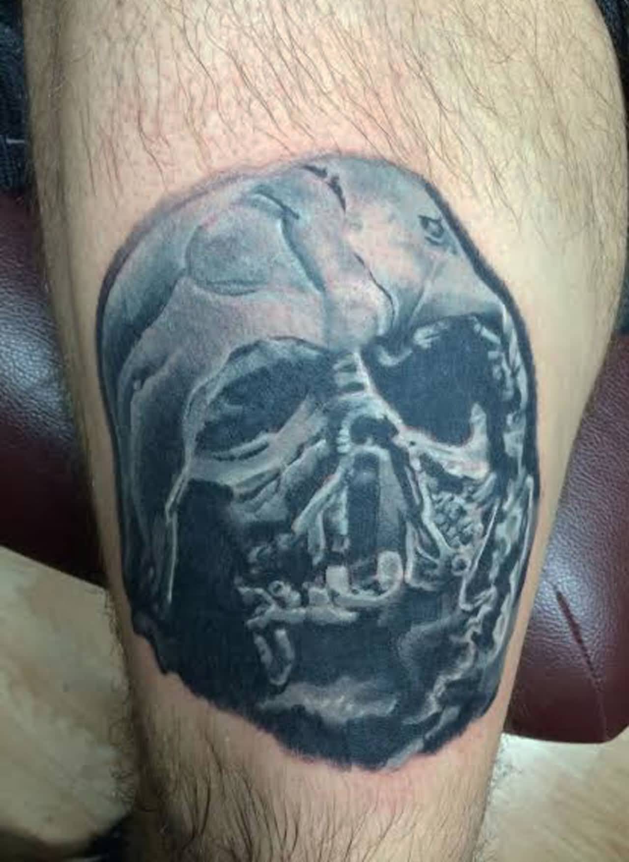 Grey Ink Darth Vader Helmet Tattoo On Leg