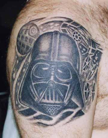 Grey Ink Star Wars Darth Vader Helmet Tattoo On Shoulder