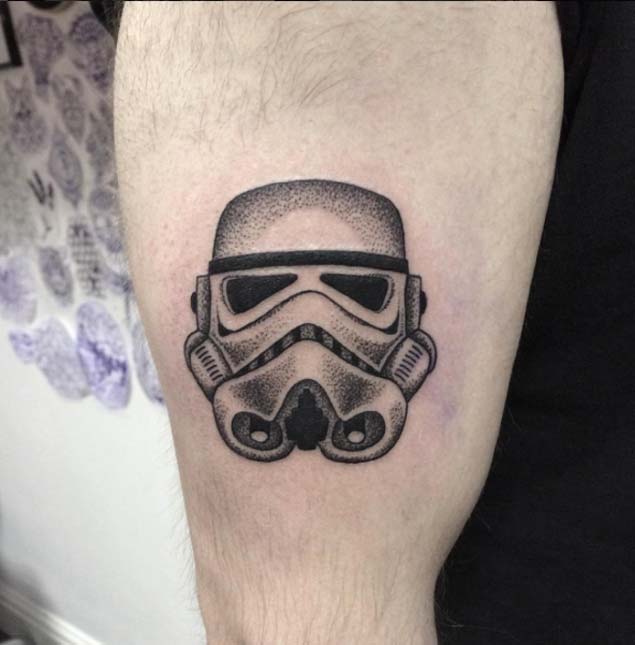 Grey Ink Star Wars Stormtrooper Tattoo On Bicep