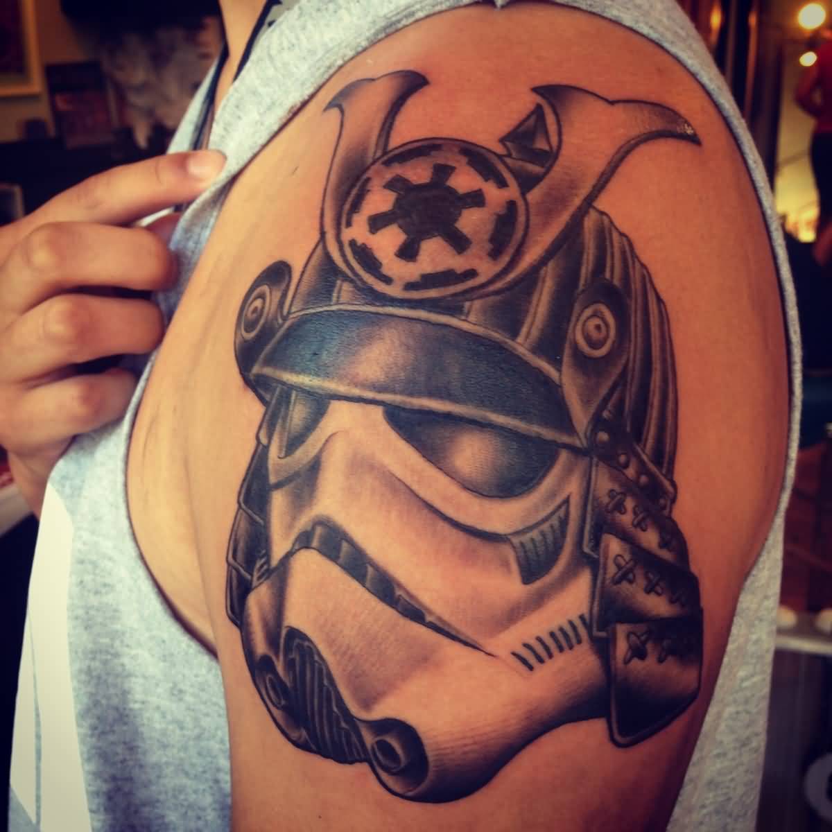 Grey Ink Stormtrooper Helmet Tattoo On Shoulder