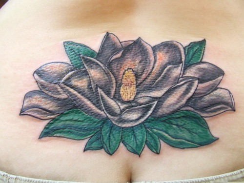Grey Magnolia Tattoo On Chest