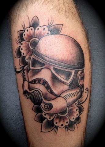 Grey Traditional Flowers And Stormtrooper Tattoo On Leg