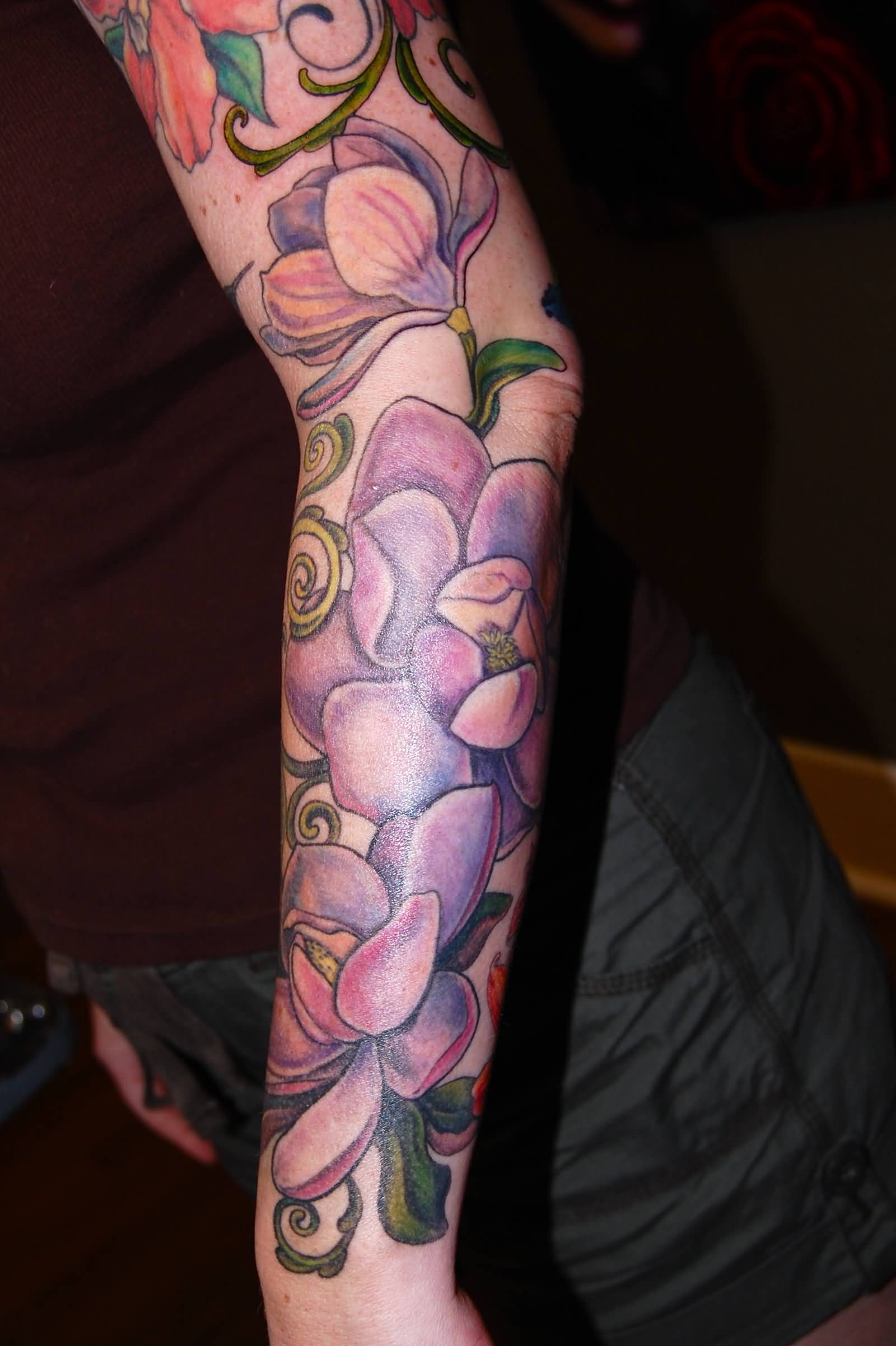 Left Sleeve Magnolia Flowers Tattoos