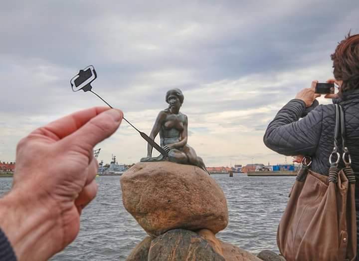 Little Mermaid Statue Taking Selfie