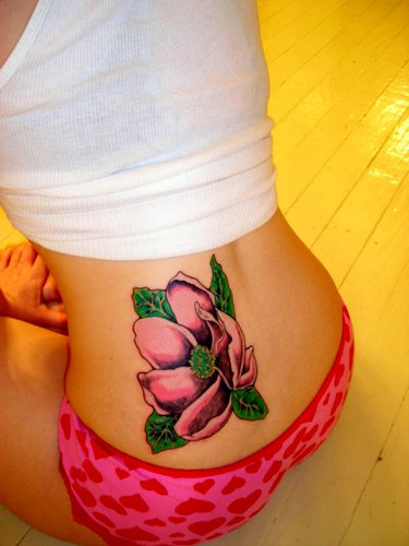 Magnolia Tattoo On Girl Lower Back