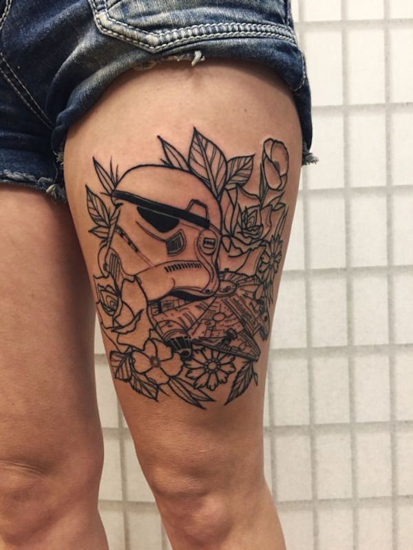 Outline Flowers And Stormtrooper Tattoo On Thigh