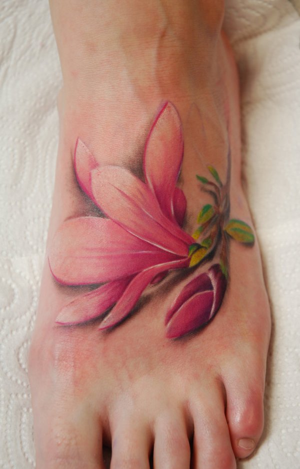 Pink Magnolia Flower Tattoo On Left Foot