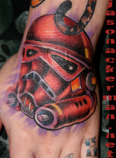 Red ink Stormtrooper Tattoo On Left Hand
