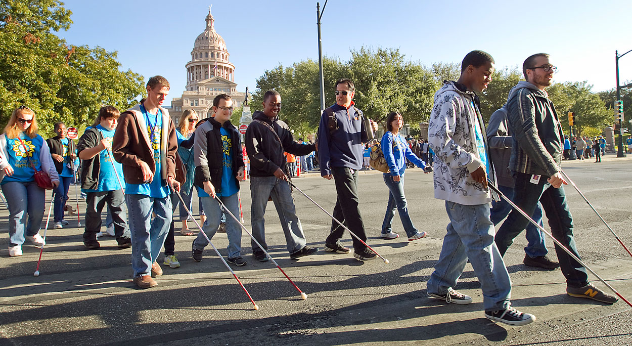 The Crowd Departs The Capitol To Begin The March Through Streets Of Downtown Ahead Of White Cane Safety Day Celebration