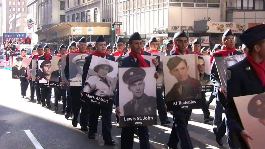 Air Force Jr. ROTC March With WWII Veterans Photos In Nation's Veterans Day Parade
