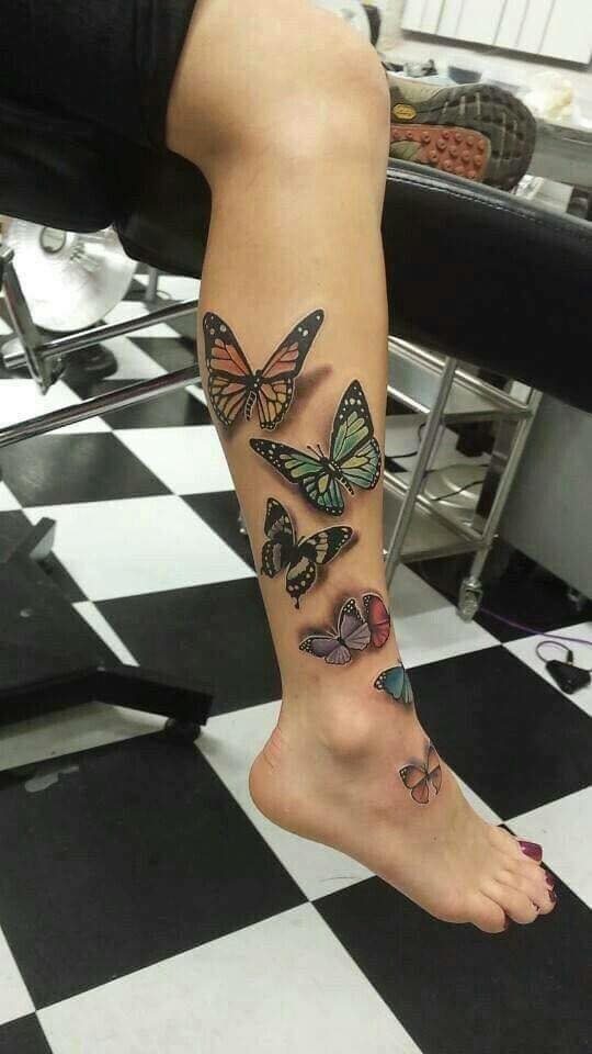 Awesome Colored Butterflies Tattoos On Leg