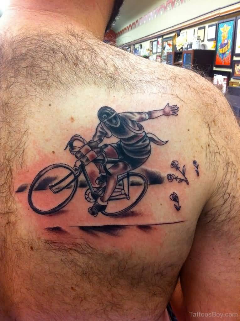 Bicycle Rider Tattoo On Right Back Shoulder