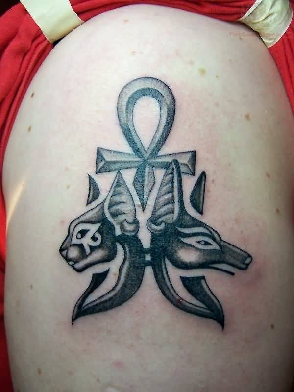 Black And Grey Ankh Tattoo On Shoulder With Bastet And Anubis
