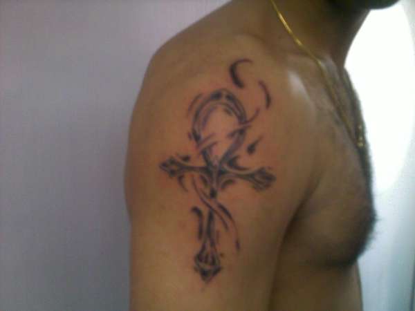 Black And Grey Ink Ankh Tattoo On Shoulder