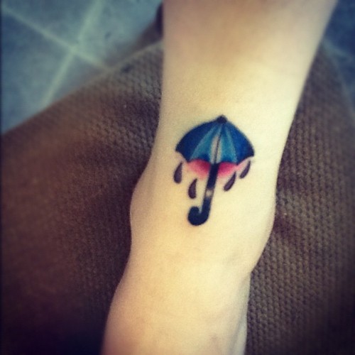 Blue Ink Umbrella Tattoo