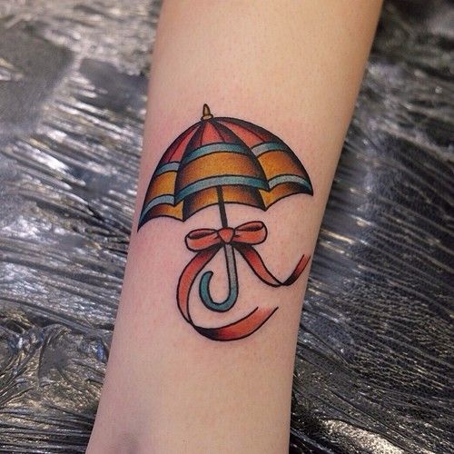 Bow With Umbrella Tattoo On Leg