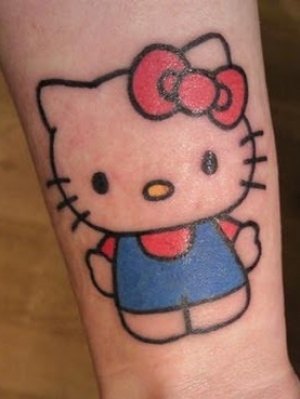 Colored Hello Kitty Tattoo On Sleeve