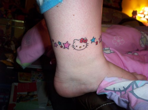 Colored Stars and Hello Kitty Tattoo On Leg