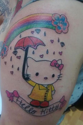 Colorful Rainbow And Hello Kitty Tattoo