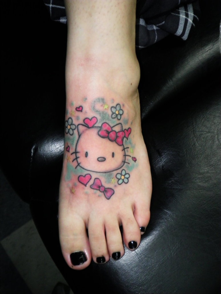 Flowers And Hello Kitty Tattoo On Left Foot