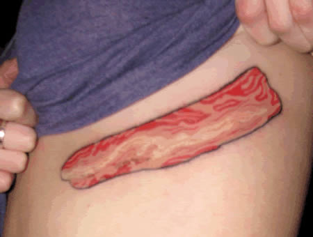 Girl Showing Her Bacon Tattoo On Side Rib