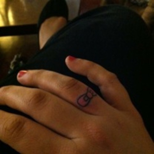 Hello Kitty Bow Tattoo On Finger For Girls
